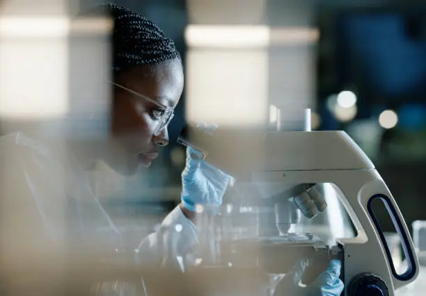 Scientist analyzing biomarkers in laboratory